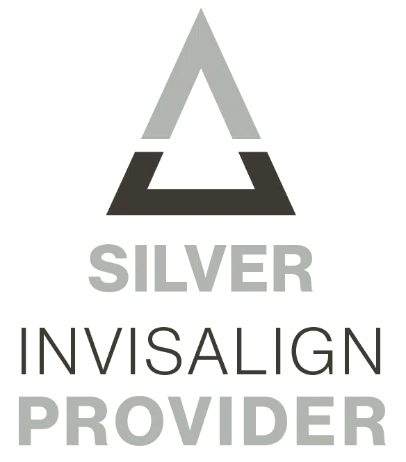The image displays a logo with the text SILVER INVISALIGN PROVIDER accompanied by an icon consisting of a triangle and two lines forming a partial circle, all set against a white background with a black border.