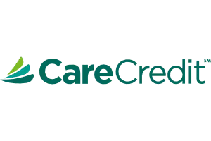 The image displays a logo with the text CareCredit in lowercase letters, accompanied by a graphic element resembling a stylized leaf or flower on the left side of the logo.