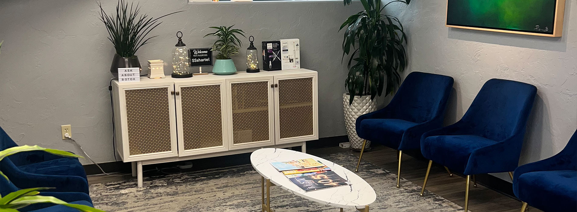 Person holding smartphone displaying dental implant simulation.